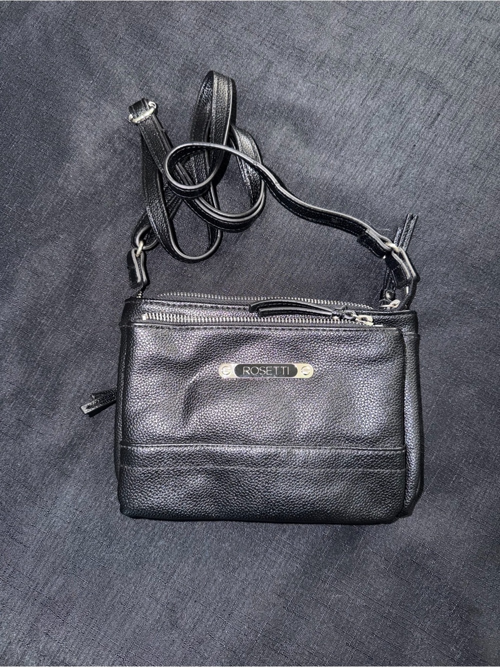 Rosetti Black Pebbled Leather Crossbody Bag with Gold Plaque